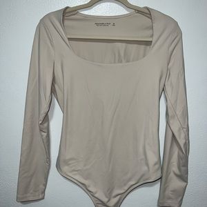 Nude long sleeve bodysuit